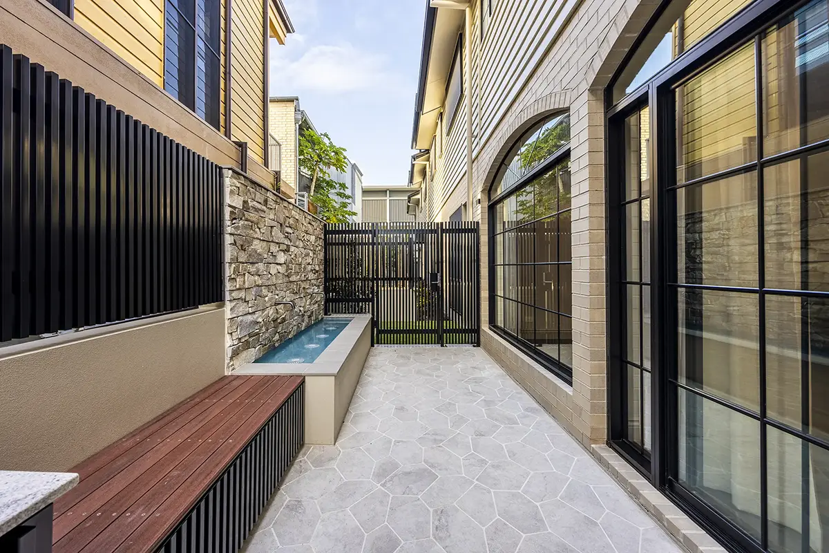 New Farm Townhouses courtyard with water feature